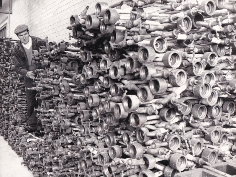 June 1976 and John Waugh, a stores assistant, is pictured with a huge stock of standpipes at the Yorkshire Water Authority depot.