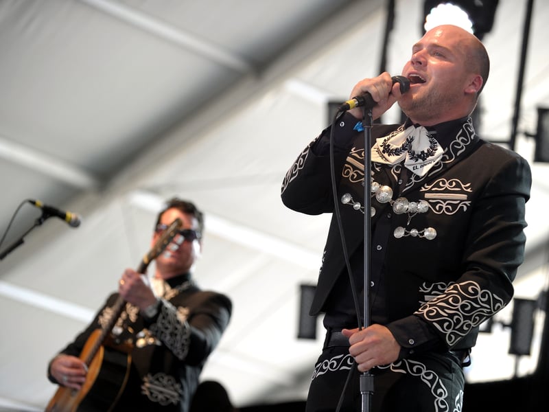This is one of the most visible and beloved alias projects of the 21st century. Mariachi El Bronx is the high-concept alter-ego of the aggressive Los Angeles punk band, The Bronx. On their mariachi albums, the band completely ditches distortion and aggression for traditional horns, Spanish guitars, and suits. They released four albums under this name and toured globally, often performing as both bands in the same night—a true commitment to the split personality.