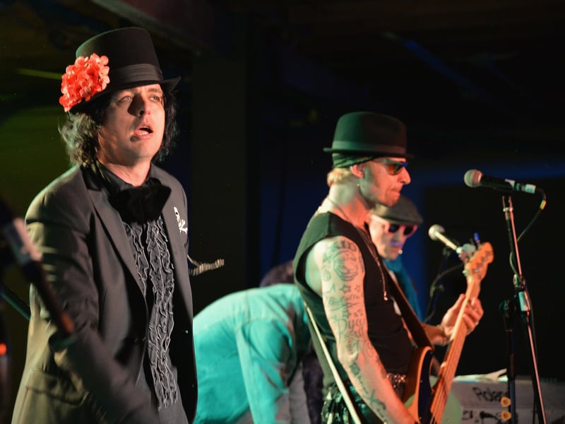 Both Foxboro Hot Tubs (60s garage rock) and The Network (synth-punk) are separate, fully-formed bands whose members are, despite years of denial, clearly the members of Green Day. These projects allowed the punk legends to explore different genres without the weight of their primary name, releasing full albums and playing smaller club gigs under the disguise.