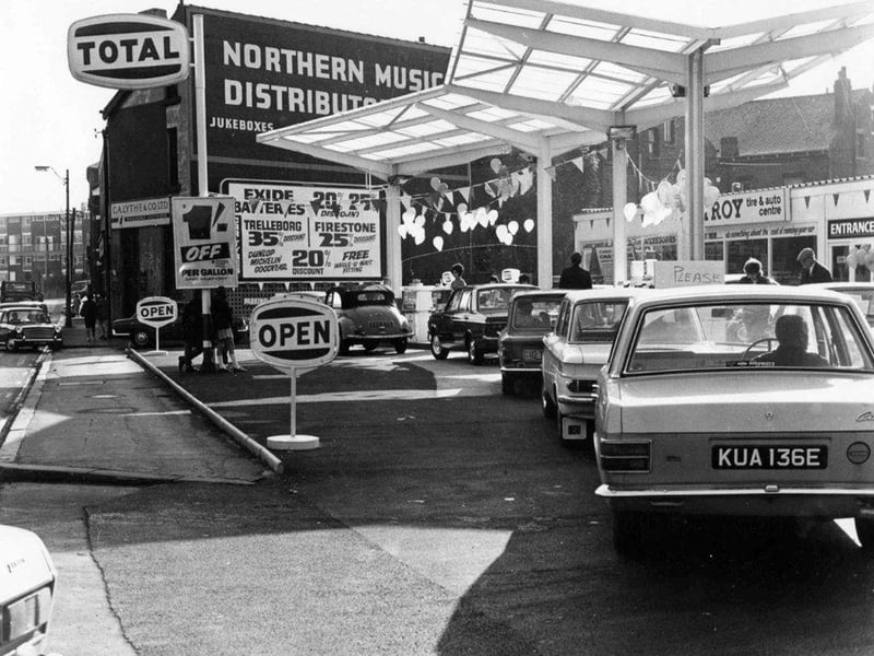 Cars queue up to visit the new branch of the motorists' supermarket, Troy Tire & Auto Centre on the opening day held on October 9, 1970. The premises were at number 15 Stanningley Road, which can be seen at the left edge.