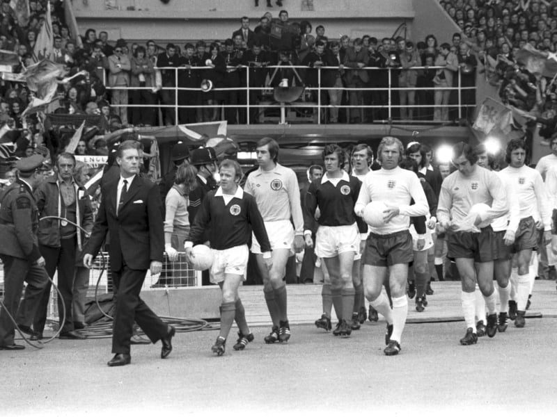 Captains Billy Bremner & Bobby Moore lead their teams out on to the pitch as Scotland face England at Wembley Stadium in May 1973