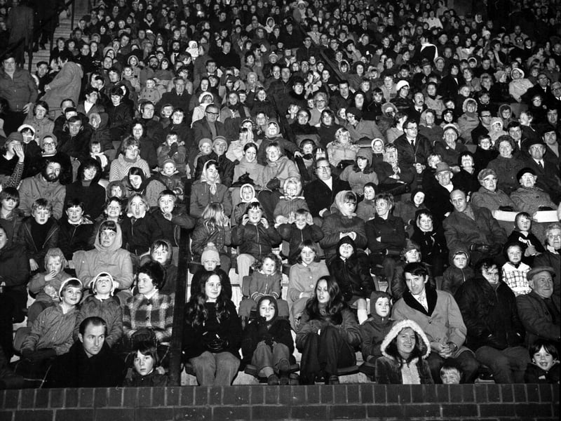 Families wrap up warm to enjoy the fireworks display at Meadowbank stadium, Edinburgh, in November 1973
