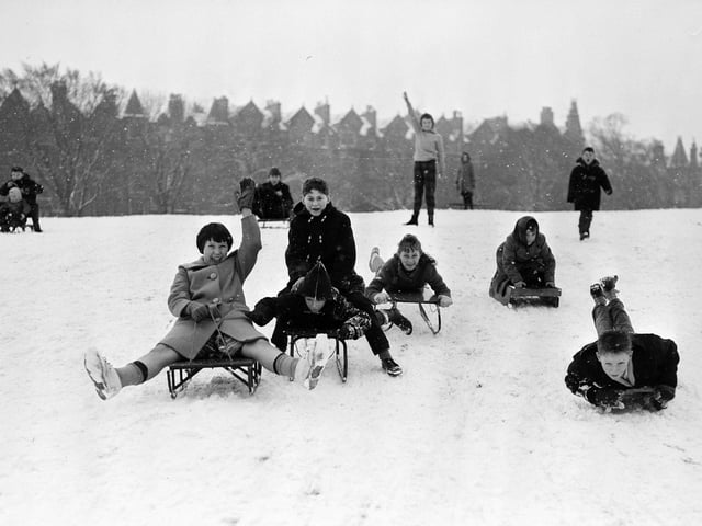 Children sledging in the Meadows in December 1961.