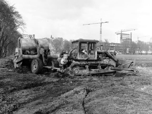 A bulldozer at work on the vacated allotments at the Meadows in March 1966.