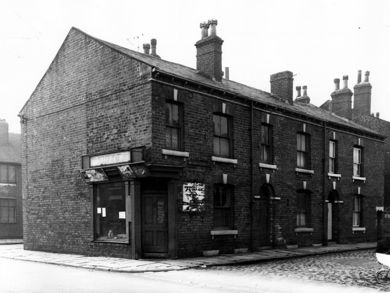 Looking across to Ailesbury Street from Amberley Road. On the left is part of Lansdowne Street. Number 1 Ailesbury Street is the shop, with a window onto Amberley Road. Pictured in October 1964.