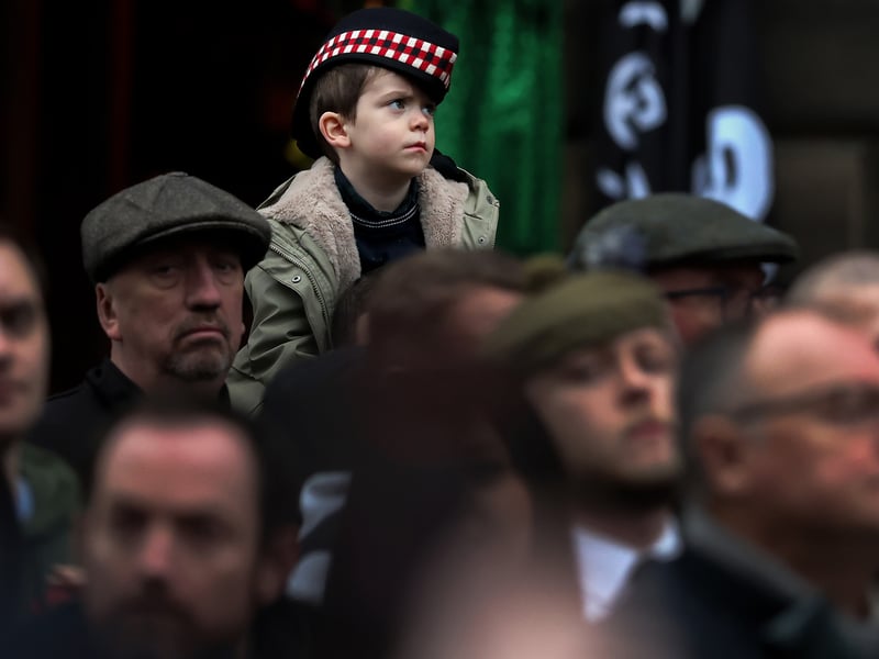 Members of the public, veterans and serving military personnel in Edinburgh on Sunday.