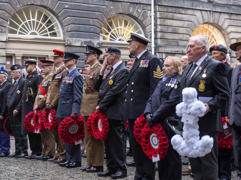 Veterans lay wreaths during a Remembrance Sunday ceremony at the Stone of Remembrance outside the City Chambers in Edinburgh.