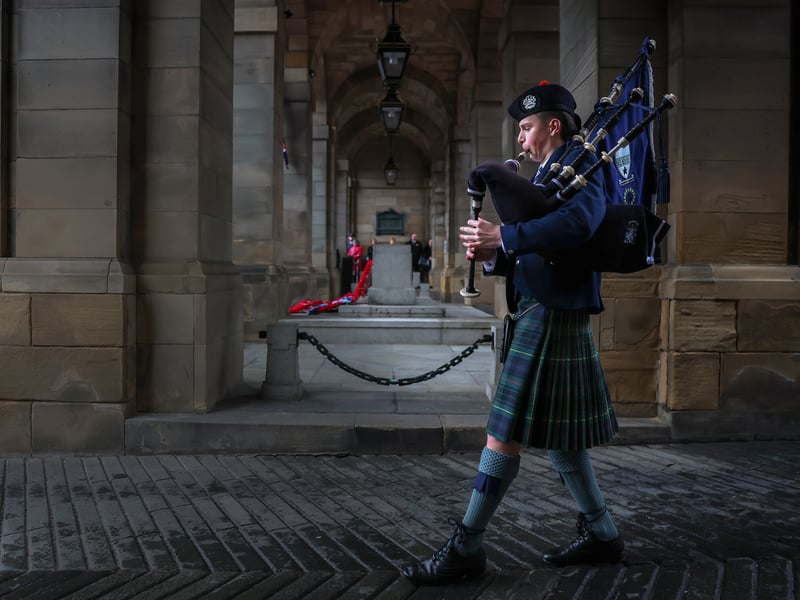 A piper plays during Remembrance Sunday tributes in Edinburgh.