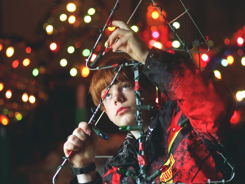 Teenager Russell Ransome who was among some 30 villagers who were making their own Christmas lights as the village was short of funds to buy them.