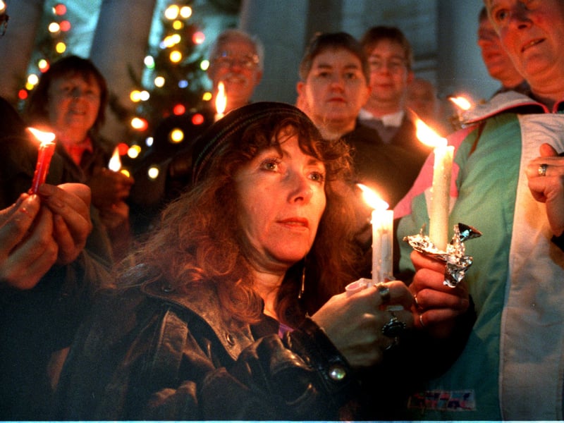 Protestors against education cuts, from F.A.C.E. Leeds (Fight Against Cuts in Education)  on the steps of Leeds Town Hall as part of a nationwide candle-lit vigil.