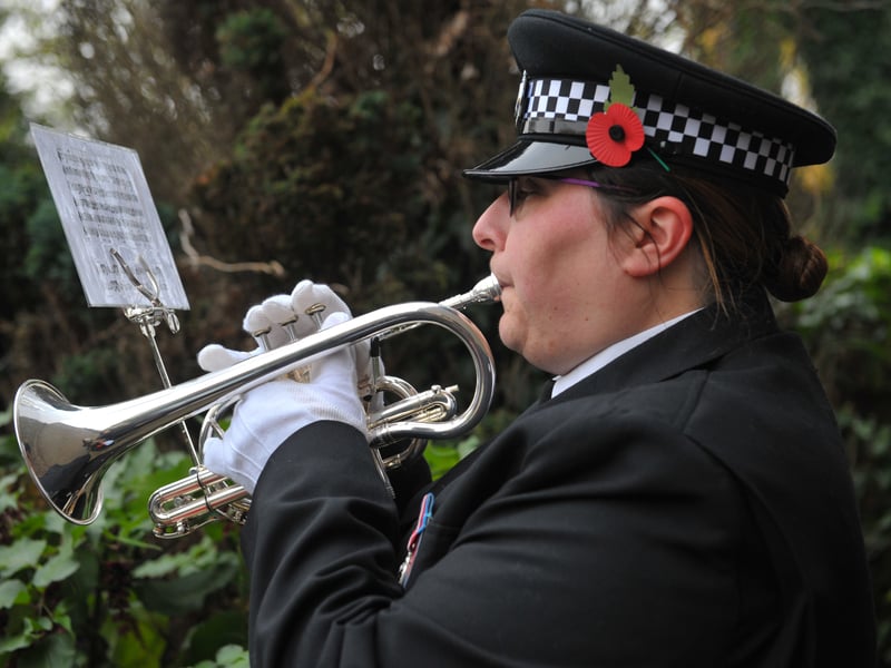 Ruth Wilson of the West Yorkshire Police Band plays The Last Post.