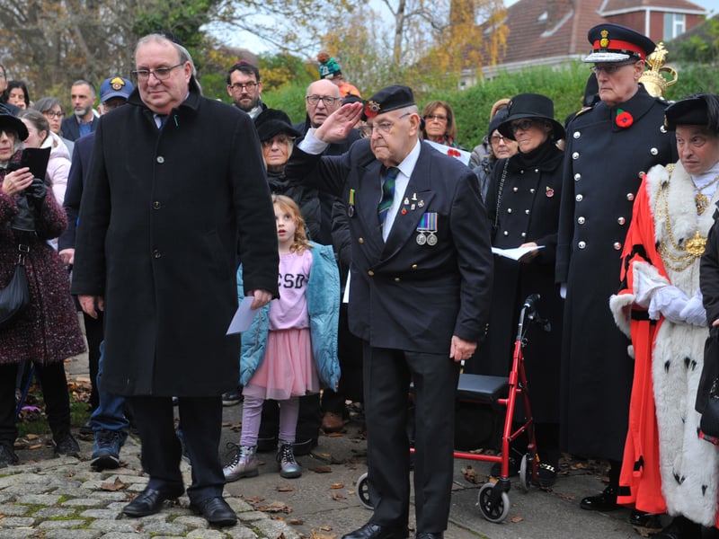 Alan Myserson, President of the Clive Berons Branch, Royal British Legion takes the salute
