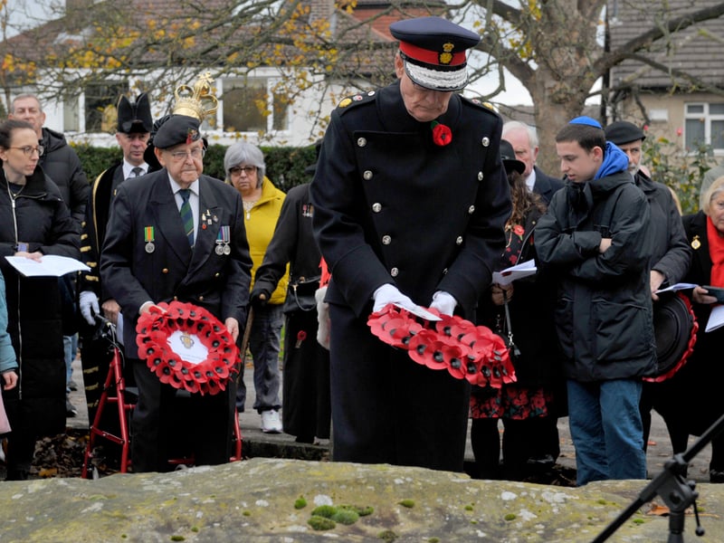 The Lord Lieutenant of West Yorkshire Ed Anderson lays a wreath at the ceremony.