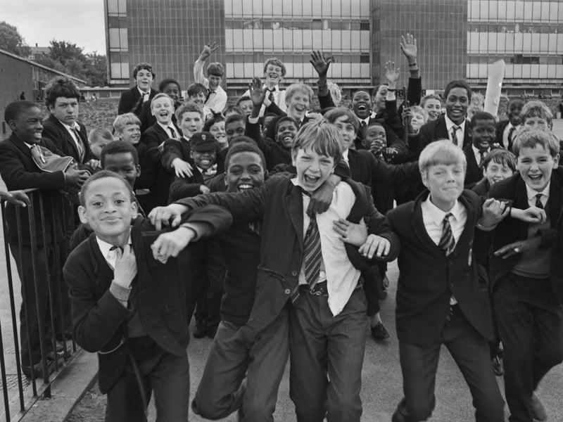 Excited pupils ready to head home after a day at school in July 1968