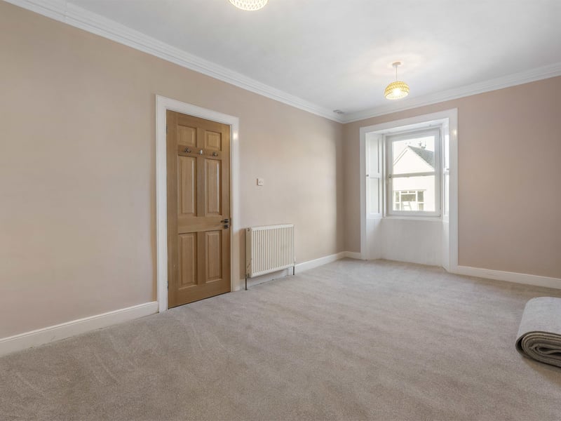 The property benefits from double glazing and modern electric heating, with on-street parking available nearby.