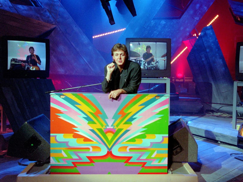 Paul McCartney appears on the TGI Friday TV show in 1995