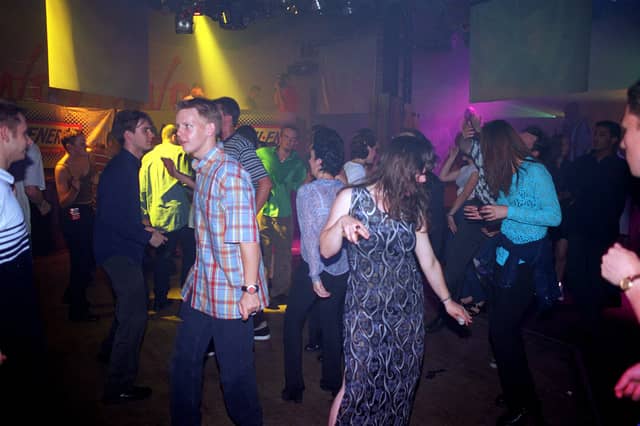 Dancers in the Warehouse nightclub, Leeds, in 1997