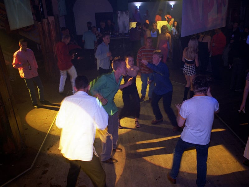 Dancers at the Warehouse nightclub, Leeds, in 1997