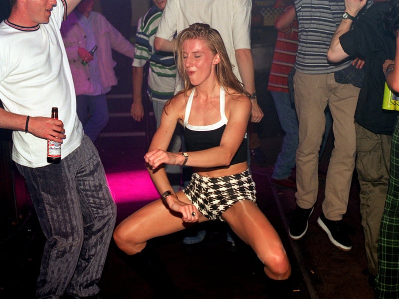Dancers at the Warehouse nightclub, Leeds, in 1997