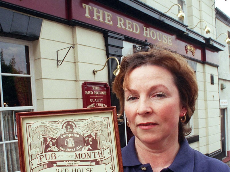 Anne Hackett, landlady of The Red House, on Solly Street, Sheffield, pictured with the CAMRA Pub of the Month award in  June 1999 