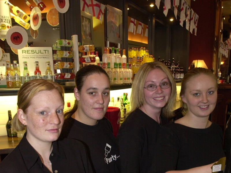 Assistant manager Emma Smiton and bar staff Rebecca Naylor, Rebecca Herring and Billa Rossi at The Fountain pub, Leopold Street, Sheffield, in June 2002