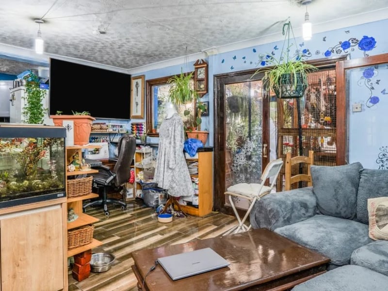 This three bedroom home is 'offering great scope for modernisation'. 