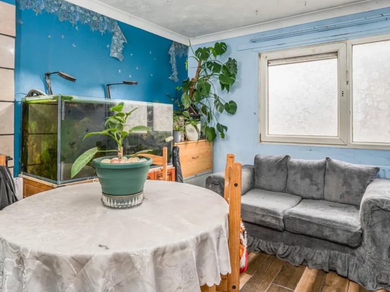 The listing says: "Spacious three-bedroom family home offering great scope for modernisation, featuring a large lounge, conservatory, kitchen with utility, and established rear garden." 
