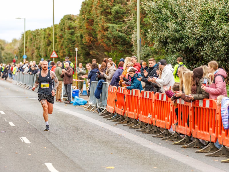 A runner approaches the finish line