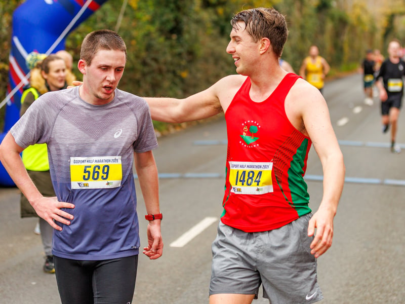 Two runners at the finish line.
