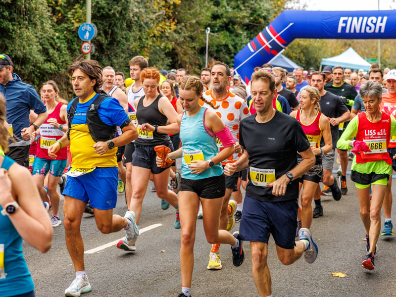 Runners cross the start line of the Gosport Half Marathon 2025