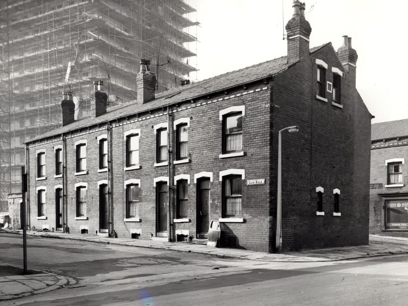 Meynell Heights is under construction in the background of this view from November 1966. Gain Walk is in the foreground. This view looks from Nineveh Road. The rest of Gain Walk has already been demolished, in line with slum clearance plans which were due to include much of the Nineveh Road area of Holbeck.