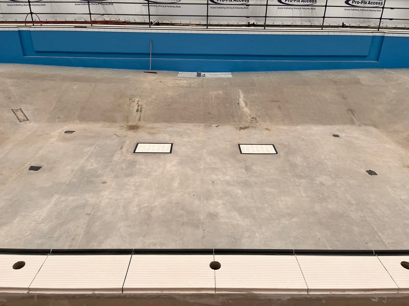 The painters are using tape to make cutting in an easier task. It's easy to do when it's a big square, but in the pool there are lots of circular filters.