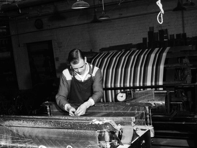 A winding machine converts skeins into cones for the other machines to use at Dundee's Old Glamis Factory in May 1964.