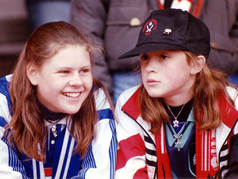 Fans Louise Foster and Caroline Porter watch Sheffield United v Sheffield Wednesday in October 1993