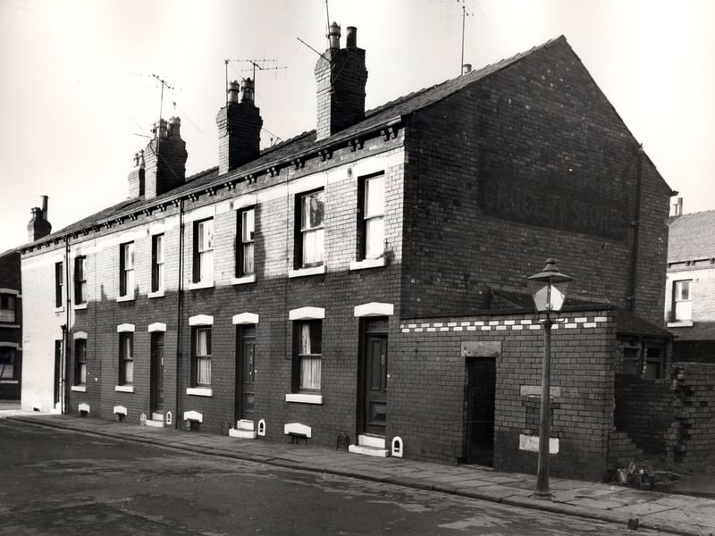 Back-to-back properties on the odd numbered side of Meynell Street, numbers run from 41 to 47 left to right with a partially demolished outside toilet block seen on the right edge. Pictured in November 1966.
