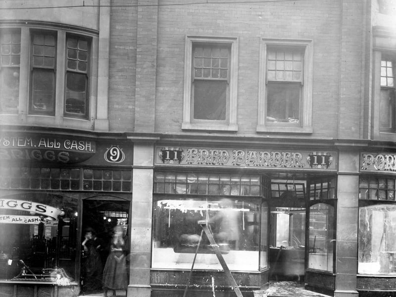 Call Lane in November 1908. Number 9 John Briggs furniture dealer. Next door at number 11 is the premises of Fred Barber pork butcher, which looks as if it is having a refit.