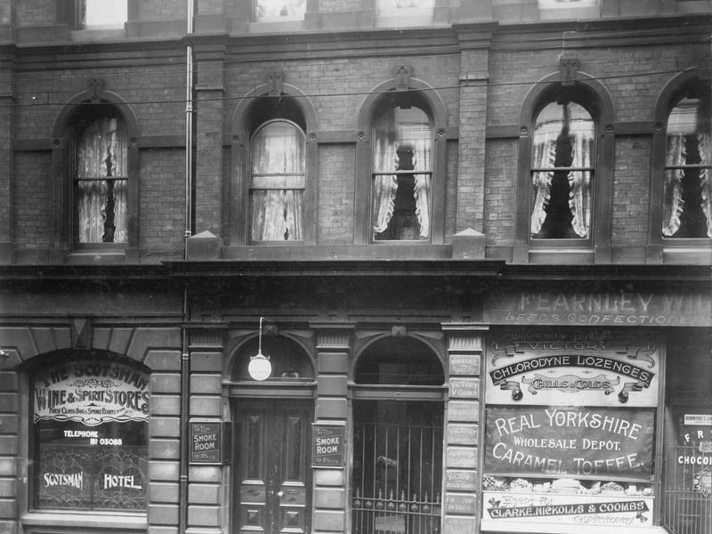 Call Lane in November 1908. Number 3 is the Scotsman Hotel, at number 5 Fearnley Wilson confectioners. The hotel has a smoke room upstairs.