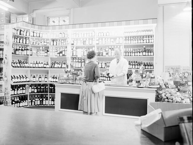 A display of wines at Mr W McLeod licensed grocer, at 340 Morningside Road, in July 1962.