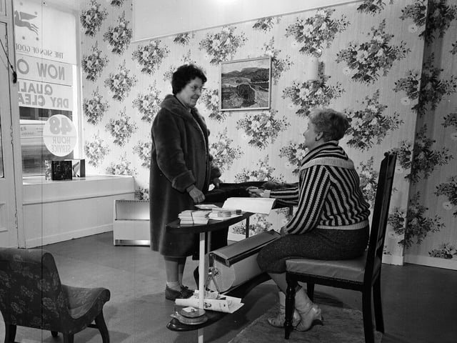 The interior of Elliot Forbes Ltd Dry Cleaners shop on Morningside Road in January 1963.