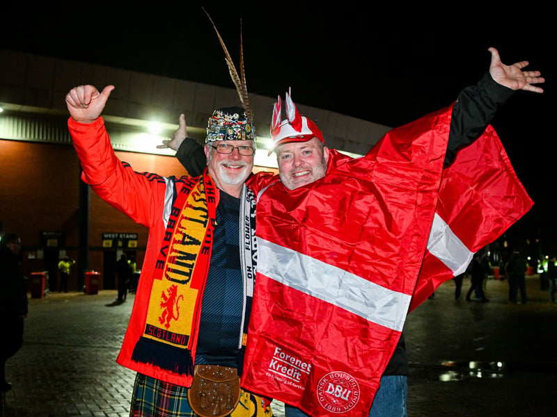 A Scotland fan and a Denmark fan outside of Hampden before the game. 