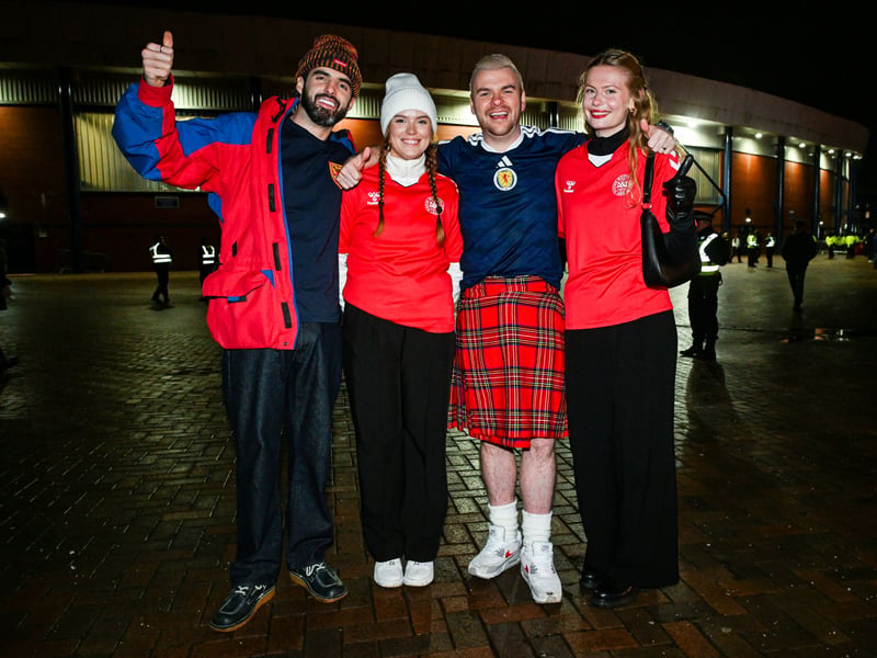 Scotland and Denmark fans pose ahead of kick-off at Hampden.