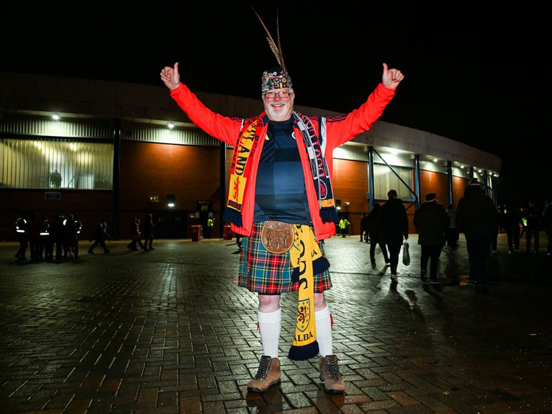 A kitted out Scotland fan gets ready for the game.