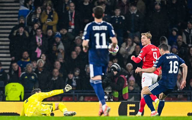 While Scotland were put under strain in the first half, the goalkeeper wasn't overworked. Pulled off a good save from Rasmus Hojlund at the start of the second half, plunging low to block his snapshot. Went the wrong way for the penalty and had no chance with the second goal. 7
