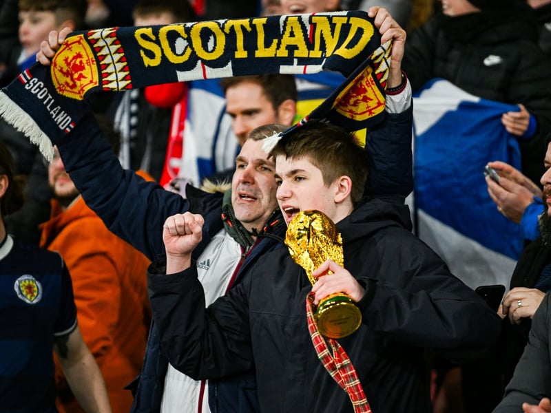 Scotland fans celebrate a famous win.