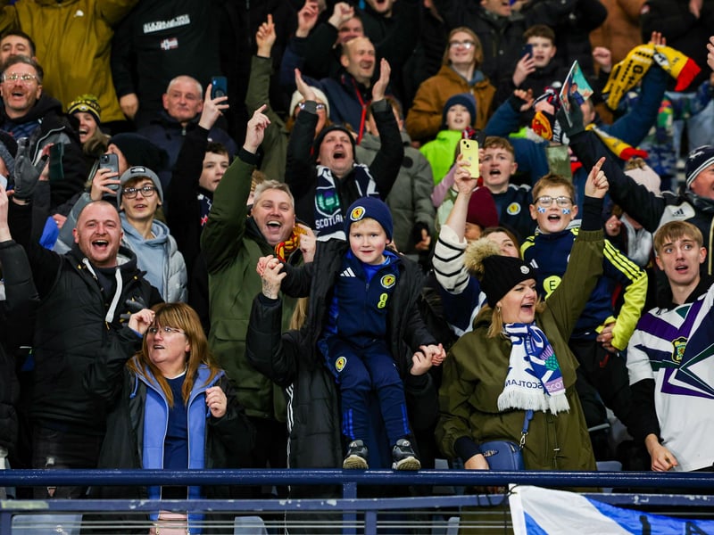 The fans celebrate at full-time.
