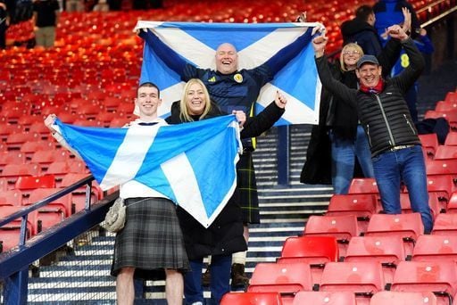 Scotland fans celebrate the famous win over Denmark.