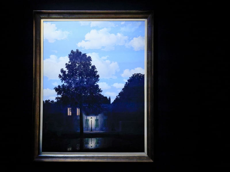 One of the most instantly recognizable images in Surrealism, this striking canvas achieves its profound dreamlike quality by juxtaposing a sunlit sky with a shadowy, nocturnal street scene, creating an impossible yet strangely familiar image that challenges the viewer's perception of light and time. The sale of this major version of the iconic series achieved an astronomical figure, solidifying Magritte's standing among the highest ranks of market-defining 20th-century artists.