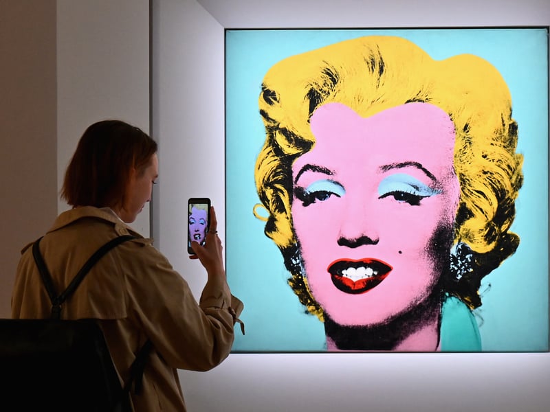 A definitive icon of Pop Art, this silkscreen portrait captures Marilyn Monroe using a revolutionary technique and belongs to the famous "Shot" series—named because a performance artist shot a bullet through the stack of canvases—representing the collision of celebrity, tragedy, and mass media. The high price reflects its undisputed status as a singular masterpiece of 20th-century art, transcending the art market to become a global symbol of American culture and iconography.