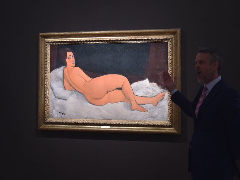 As the largest painting Modigliani ever created and the only horizontal nude to contain the model's entire figure within the canvas, this monumental work represents the culmination of his revolutionary approach to the genre, which shocked viewers at his only solo show in 1917. The sale price highlights the market's consistent reverence for Modigliani’s erotic, elongated figures, which blend classical structure with modern psychological intensity.