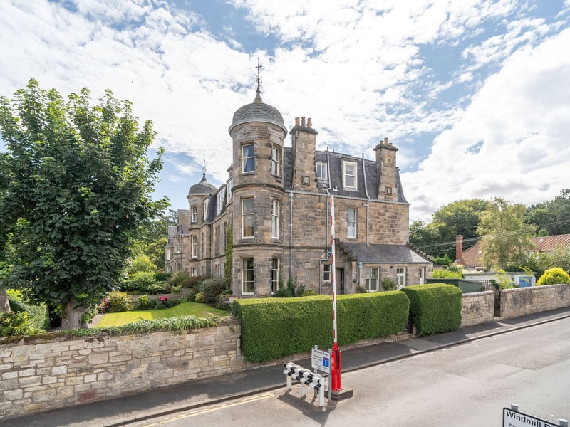 The gated entrance is located off Windmill Road, with the communal entrance stairwell for the two upper apartments in the building also having undergone recent refurbishment.